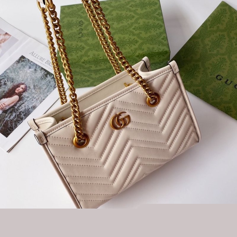 G*u*i shopping bags